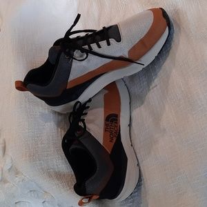 The North Face men's shoes. Tan, rust, gray and black color. Vibram soles.